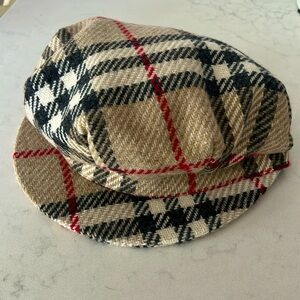 Burberry plaid messenger hat.
